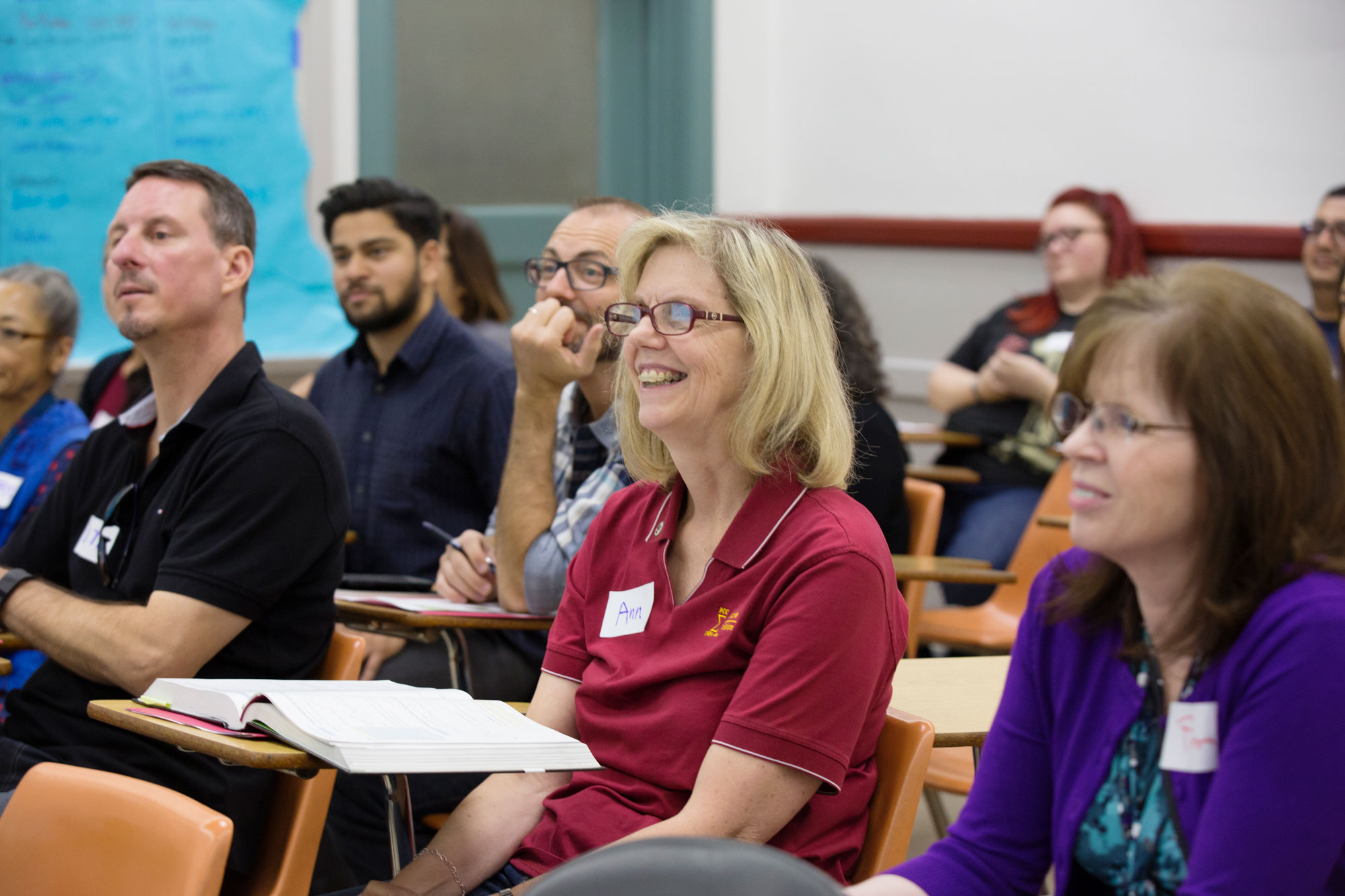 PCC employees sit in a professional development session