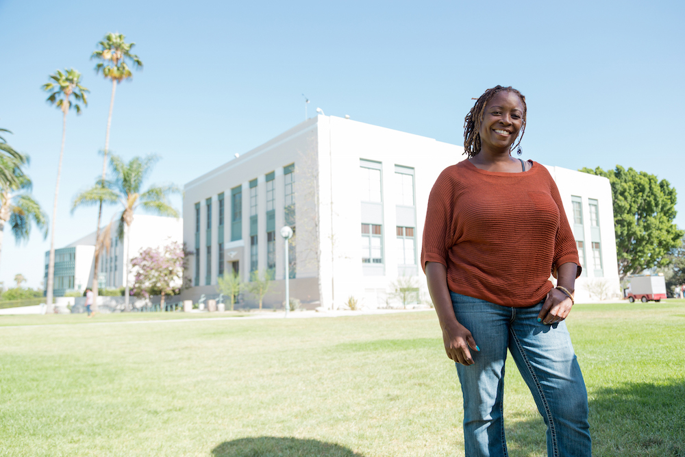 Leah Whetson, a noncredit student, poses in front of the PCC campus.