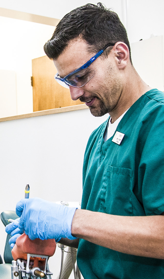 Dental hygiene student receives practical training.