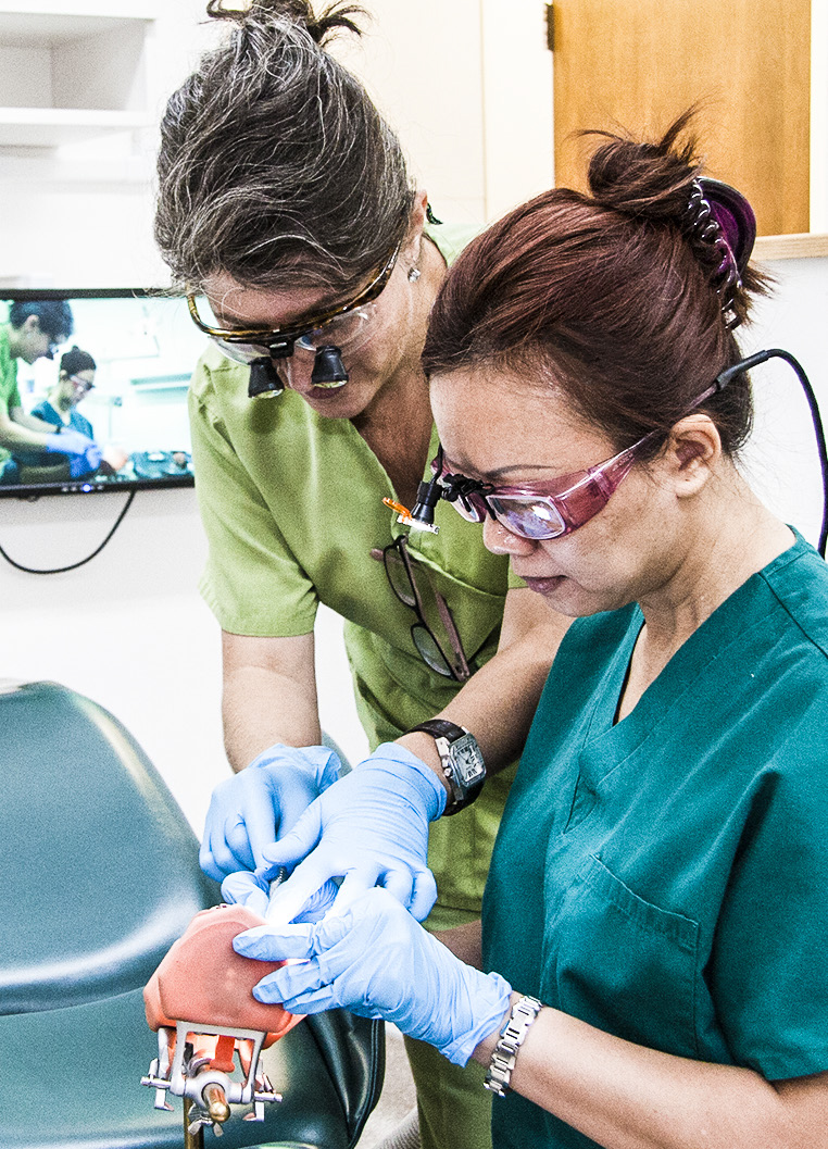 Dental Hygiene student work in class.