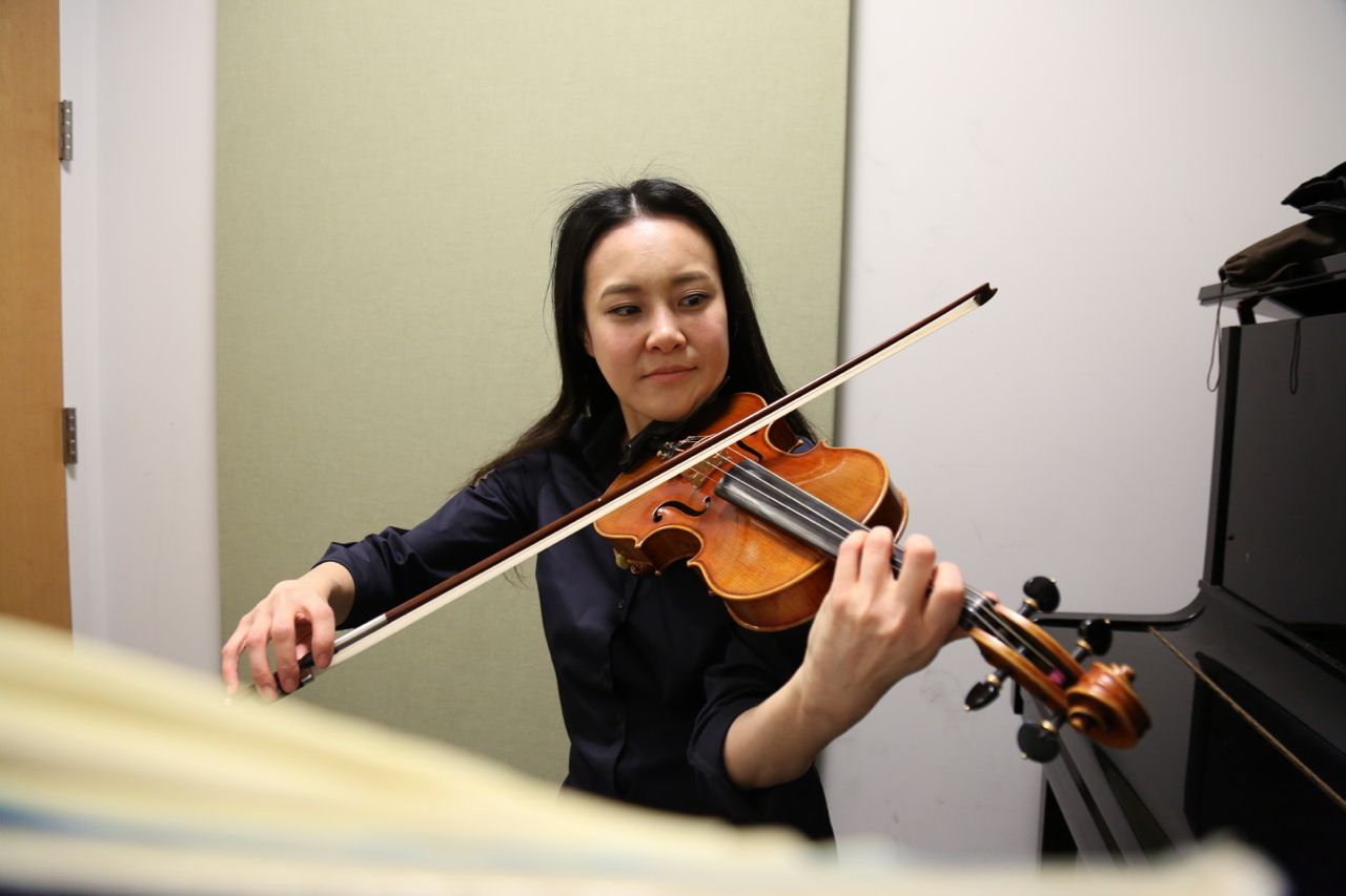 A student practices in the music lab.